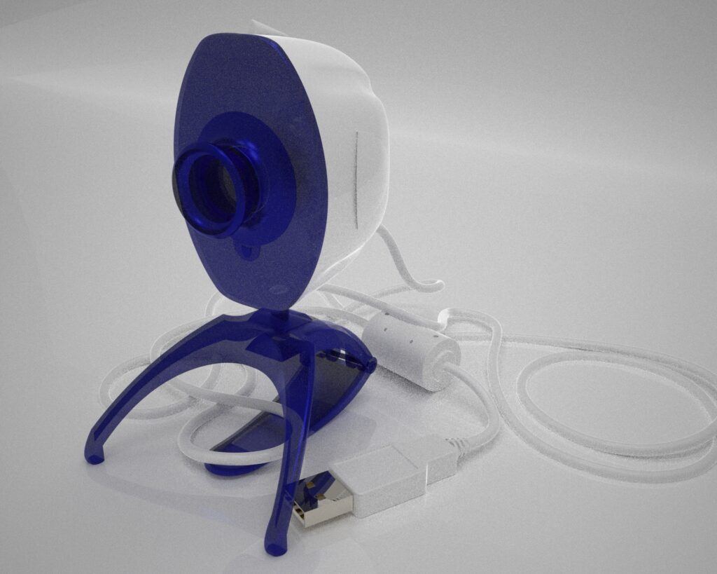 Render 3D di una webcam bianca e blu con cavo
